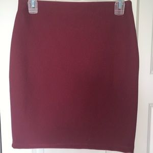 A beautiful maroon mini pencil skirt.